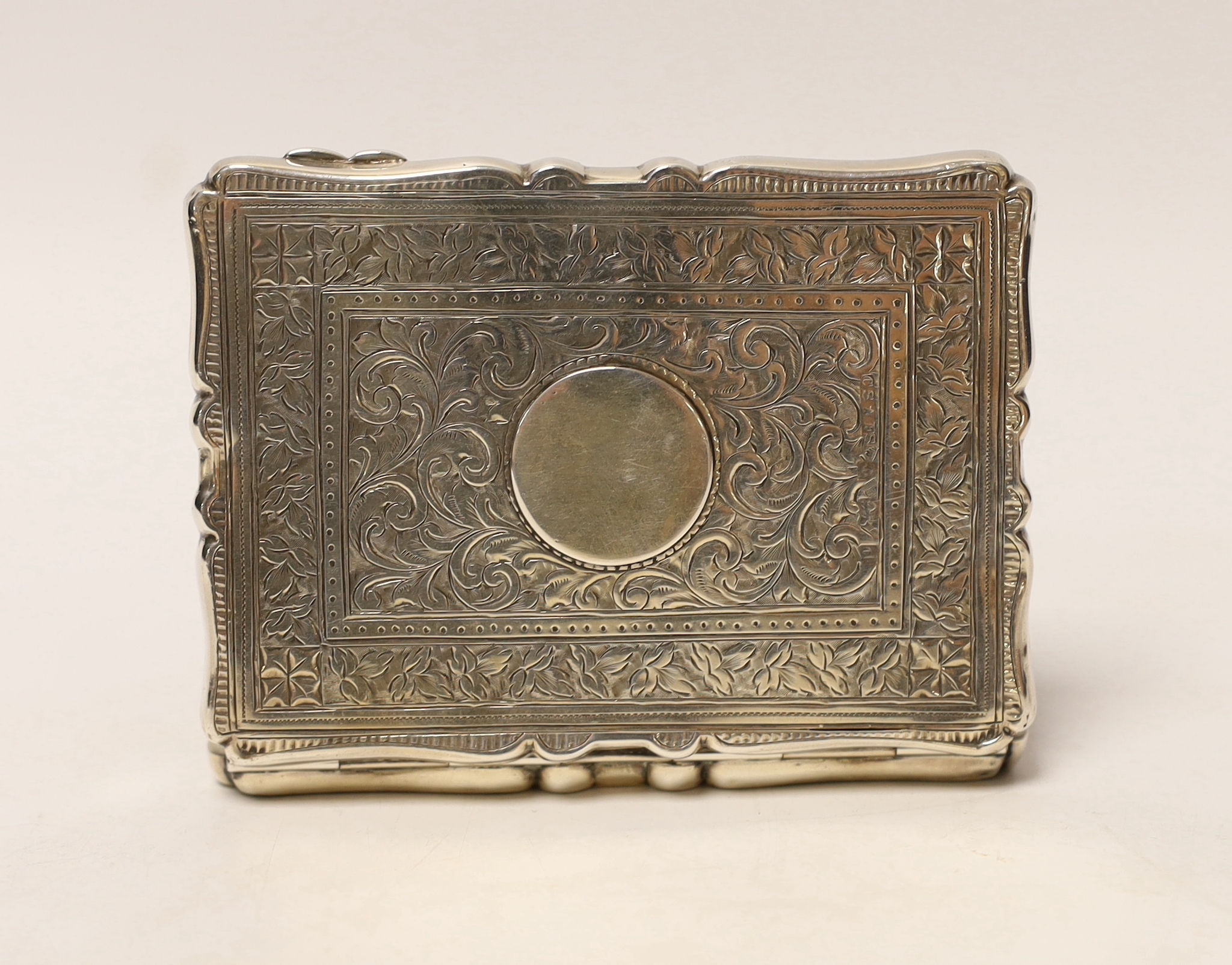 An Edwardian engraved silver card purse, Saunders & Shepherd, Birmingham, 1903, 9.8cm.